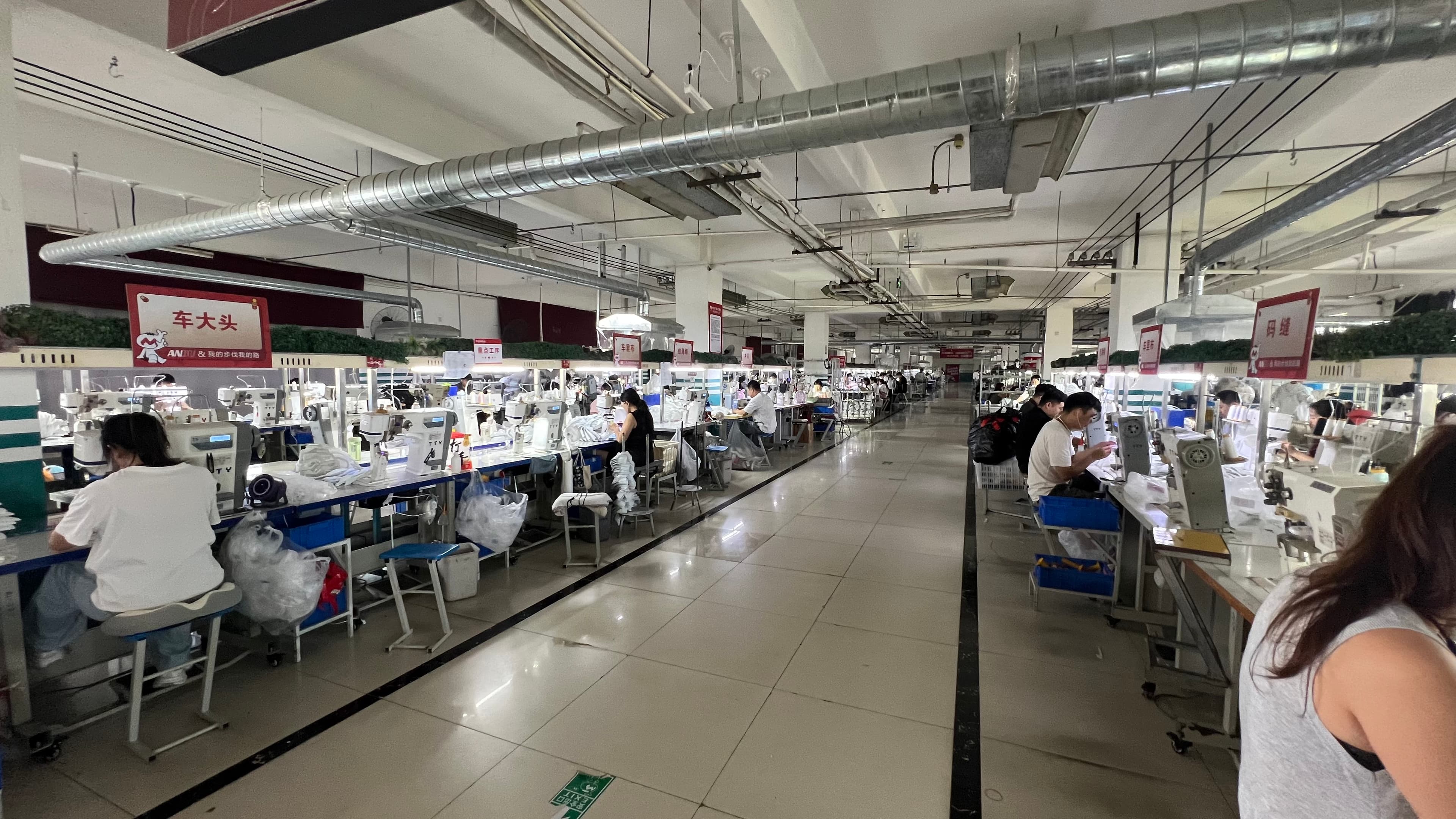 Mingjian Footwear sewing floor with parallel workstation rows
